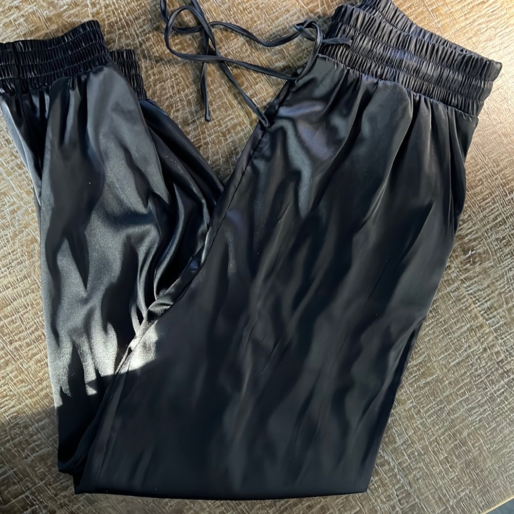 Satin high waisted joggers. Size small. Brand new with no tags.